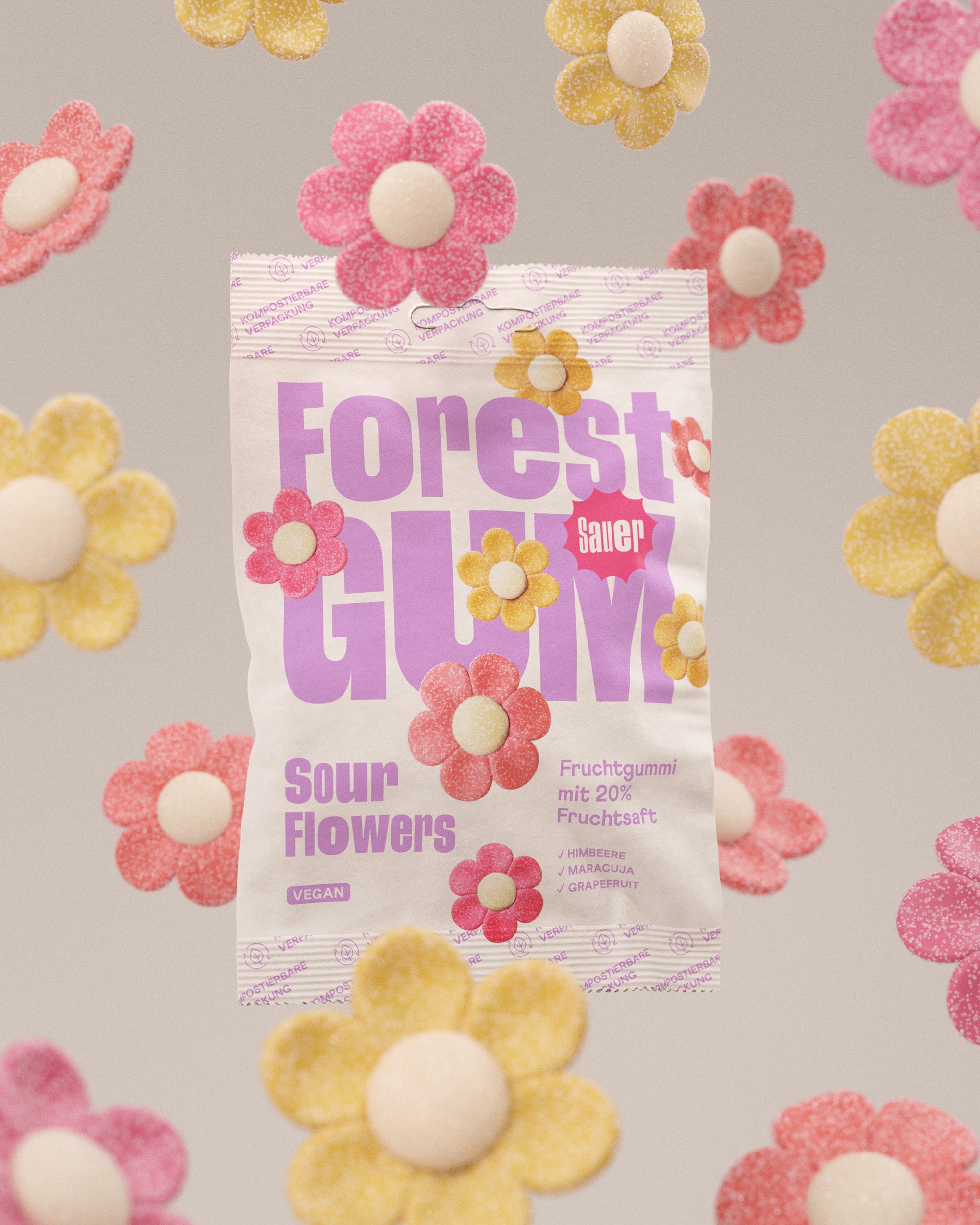 Eine Packung Forest Gum Sour Flowers, Vegane saure Fruchtgummis umgeben von schwebenden Fruchtgummi Blumen