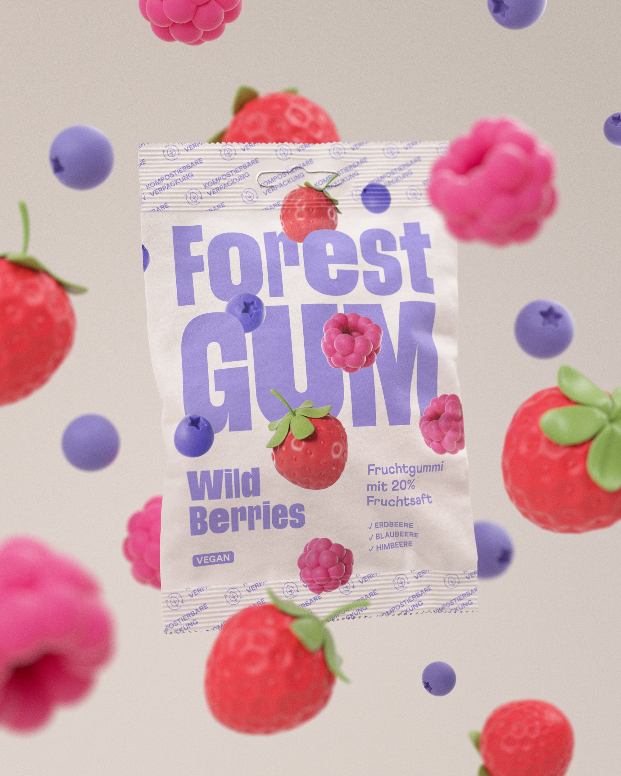 Eine Packung Forest Gum Wild Berries, Vegane Fruchtgummis umgeben von schwebenden Fruchtgummi Beeren