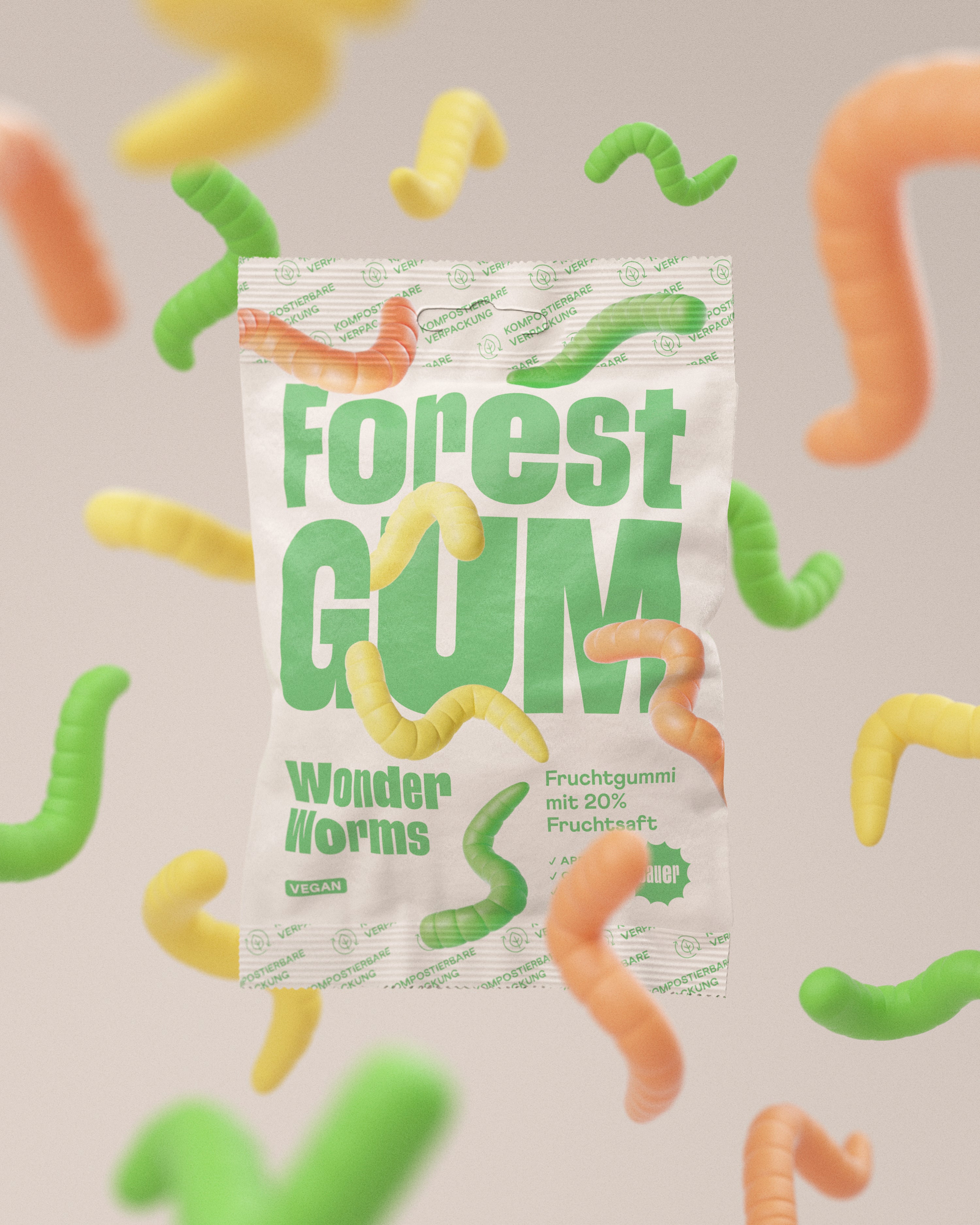 Eine Packung Forest Gum Wonder worms, Vegane saure Fruchtgummis umgeben von schwebenden Fruchtgummi Würmer